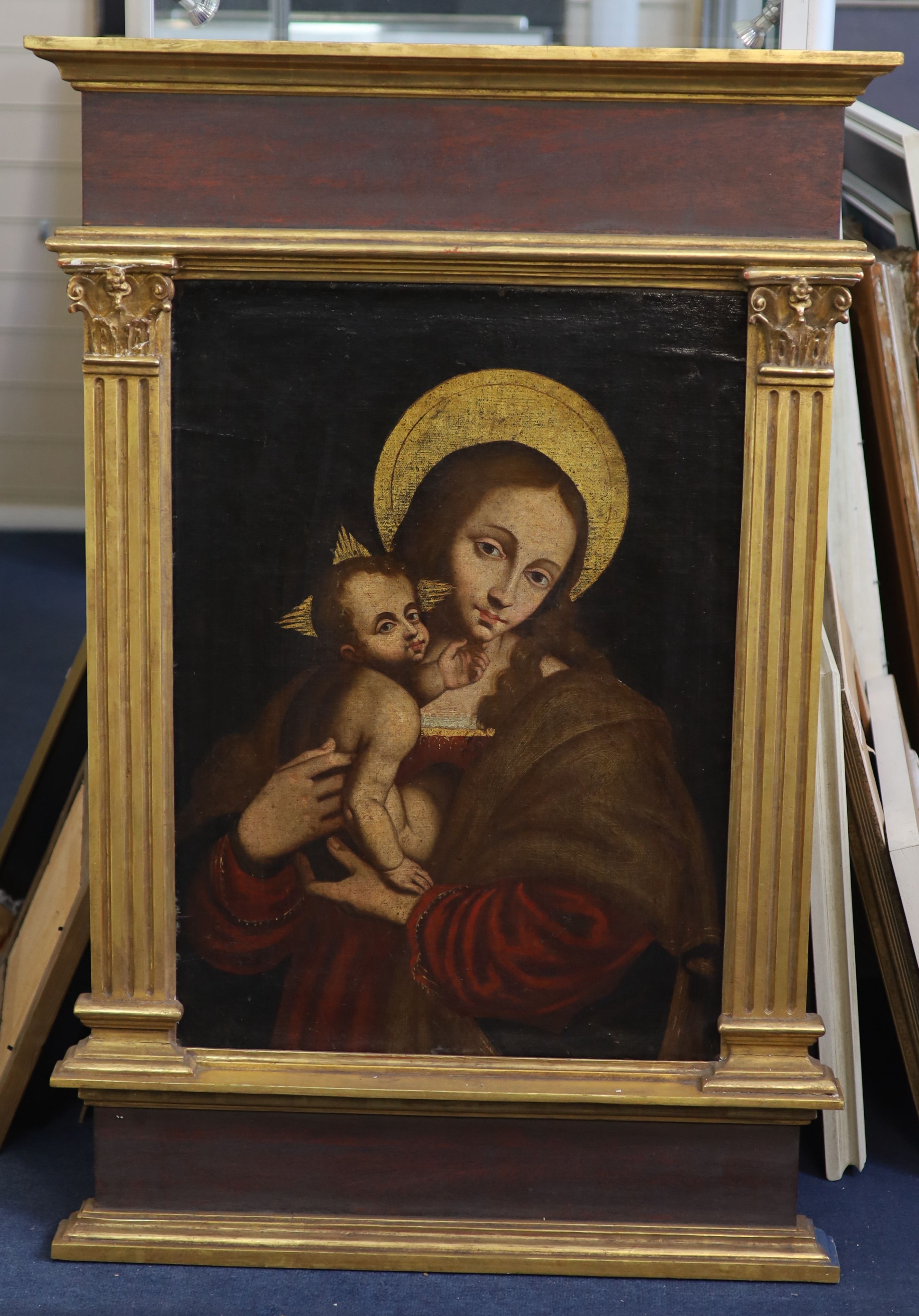 16th century style Italian School , Madonna and child, oil on canvas, 70 x 49cm, housed in an ornate Tabernacle style frame